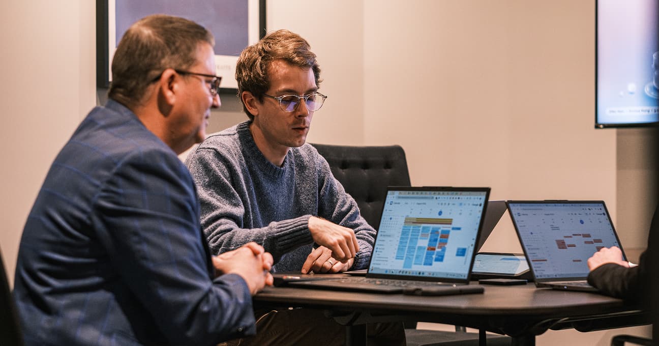 Two equNorth staff working together on marketing execution